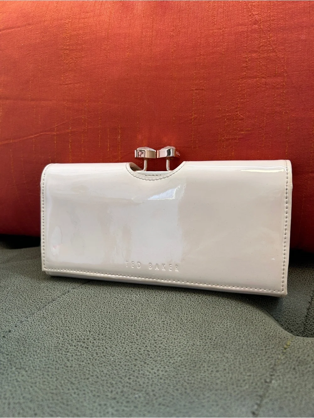 Ted Baker Glossy Patent Clutch in Light Cream